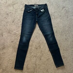 Buckle skinny jeans